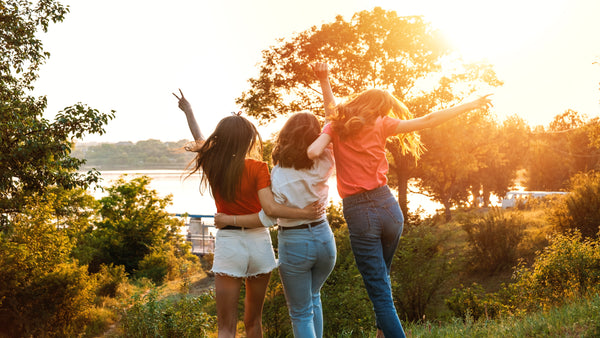 3 young ladies feeling happy